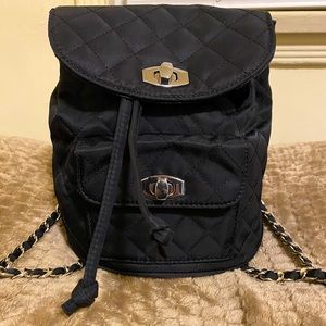 Forever 21 black mini quilted backpack with drawstring.